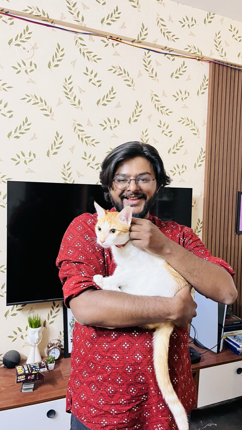 Rinkesh Gorasia with his cat Simba